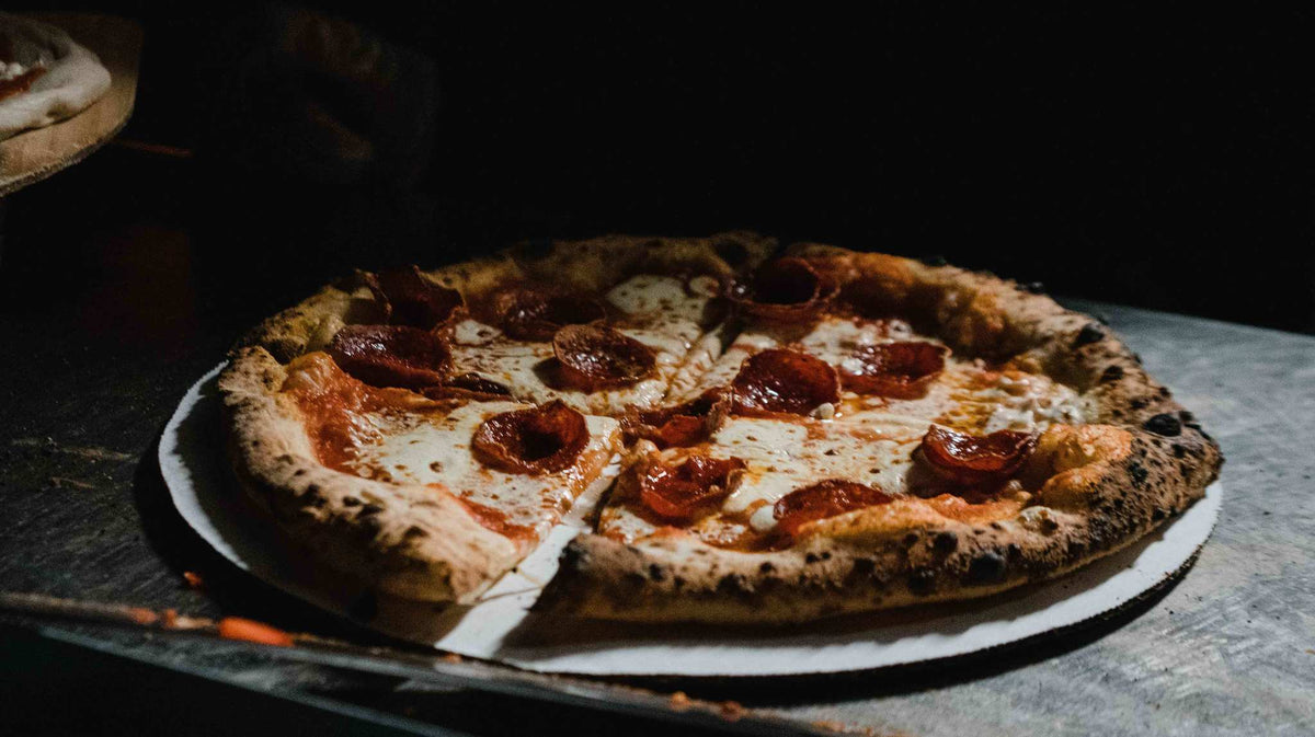 4 Ways Pizza CAN Fit Into Your Training Plan, According to Dietitians